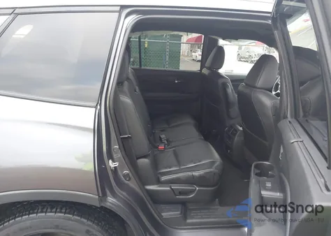 2019 Honda Passport Elite z USA, uszkodzony, nr VIN 5FNYF8H01KB006690